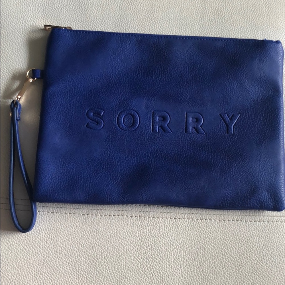 Sorry-not sorry clutch blue leather -NEVER WORN